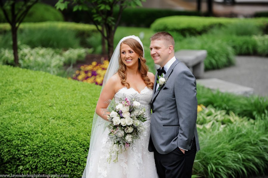 <alt> bride and groom outside of the Omni William Penn in Pittsburgh, Pennsylvania</alt>