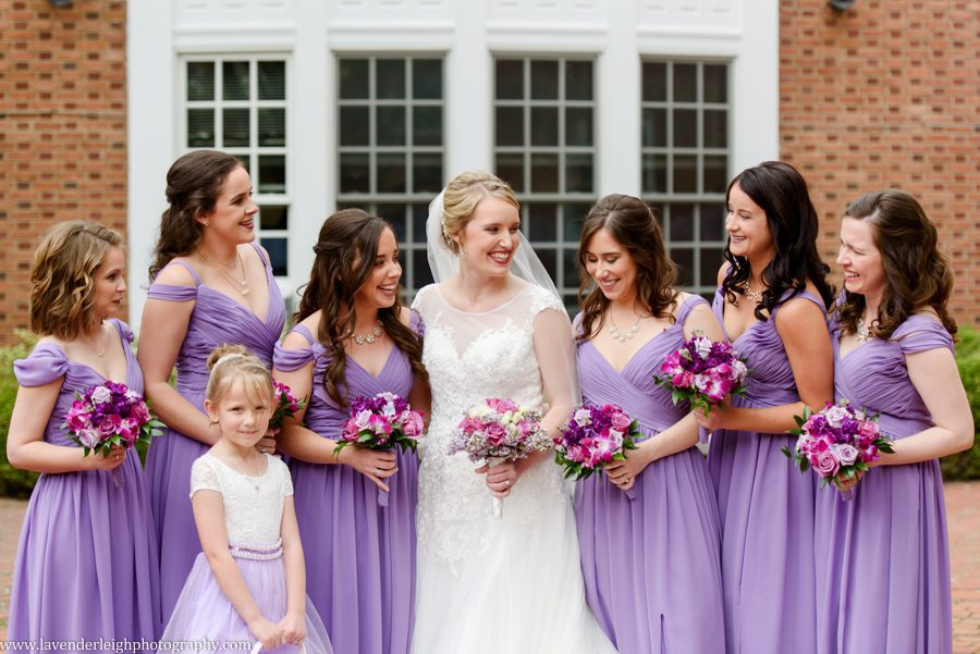 <alt> bride laughing with bridesmaids at Westminster Presbyterian Church in Upper St. Clair, Pennsylvania</alt>