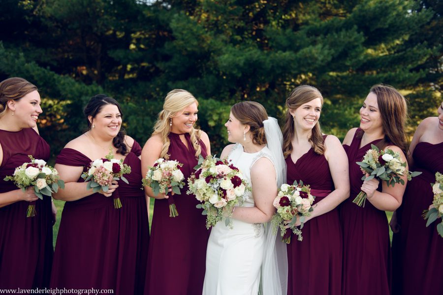 <alt> bride laughing with bridesmaids at Westmoreland Country Club in Export, Pennsylvania</alt>