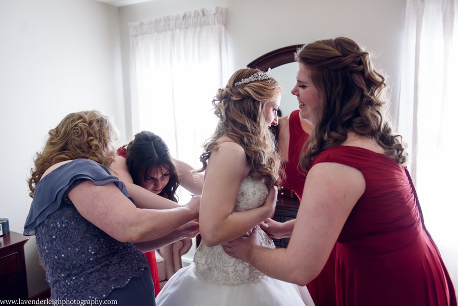 A winter wedding in Pittsburgh, Pennsylvania. The ceremony took place at St. John and Paul church, and the reception was hosted at the Chadwick ballroom in Wexford. Images by Lavender Leigh Photography. 