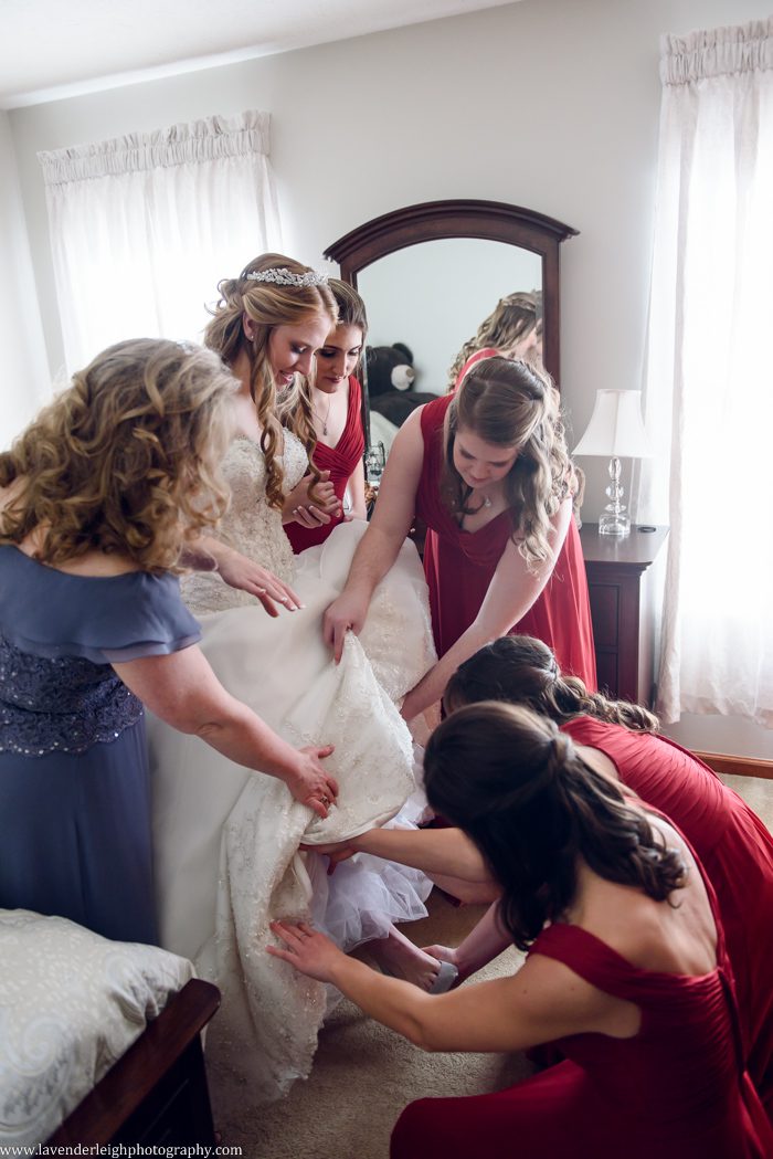 A winter wedding in Pittsburgh, Pennsylvania. The ceremony took place at St. John and Paul church, and the reception was hosted at the Chadwick ballroom in Wexford. Images by Lavender Leigh Photography. 