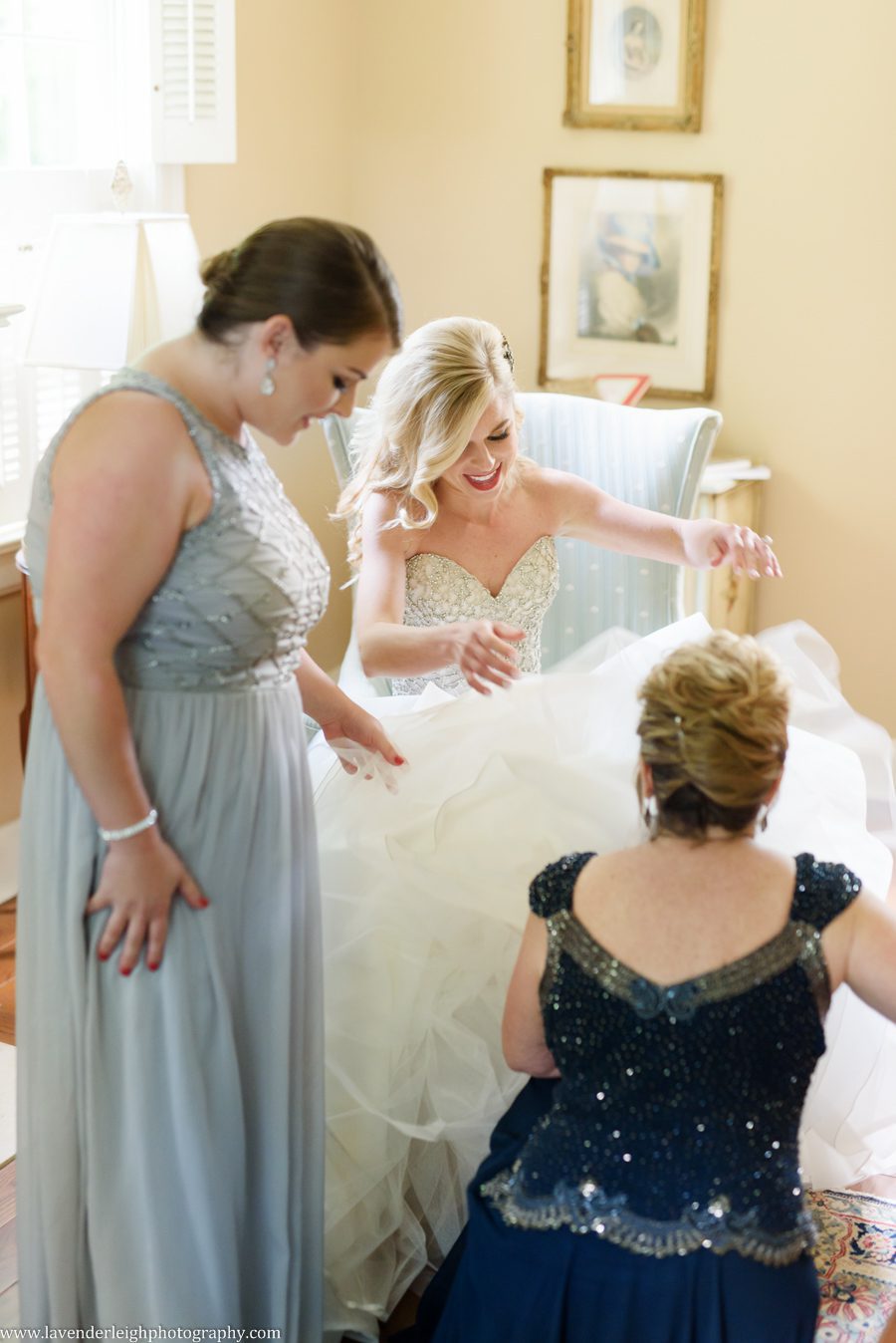 mother of bride putting garter on bride, bride, wedding dress, bridal beginnings, lavender leigh photography, Pittsburgh wedding photographer, engagement, boudoir, best of, chartier’s country club, st. Philip church, rosslyn farms, crafton, Pennsylvania, summer, june, golf club, 
