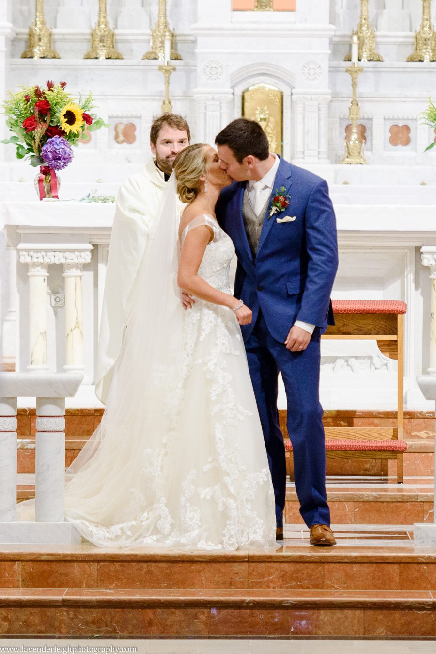 First Kiss at Wedding Ceremony at Holy Family Church in Latrobe, Pennsylvania