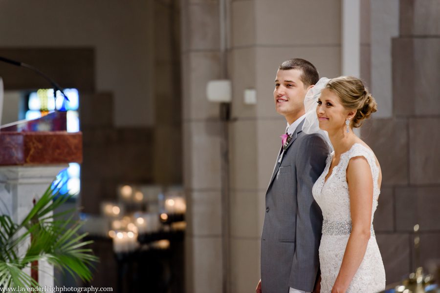 Bride and Groom Enjoying their Wedding Ceremony at the Immaculate Conception Parish in Washington, Pennsylvania