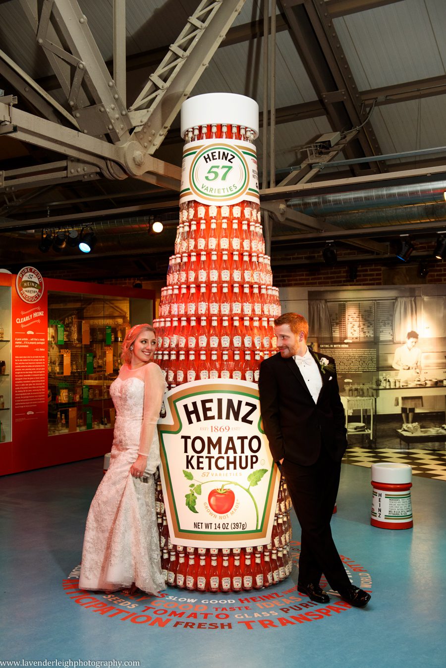 A bride and groom in the sports floor of the Heinz History Center