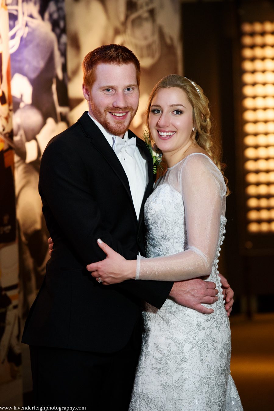 A bride and groom on the Sports floor of the Heinz History Center