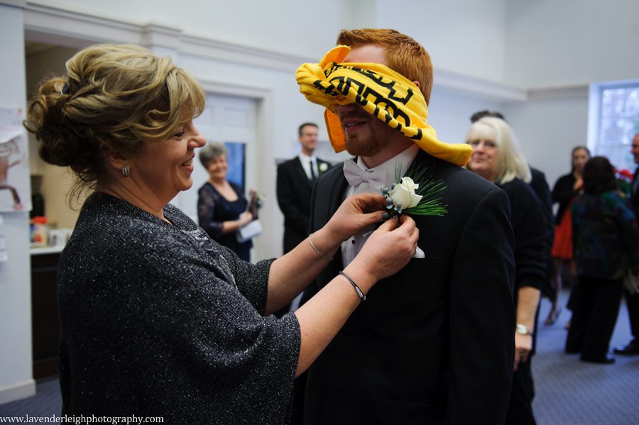 A Pittsburgh groom's version of having his boutonniere being pinned with a terrible towel blindfold on