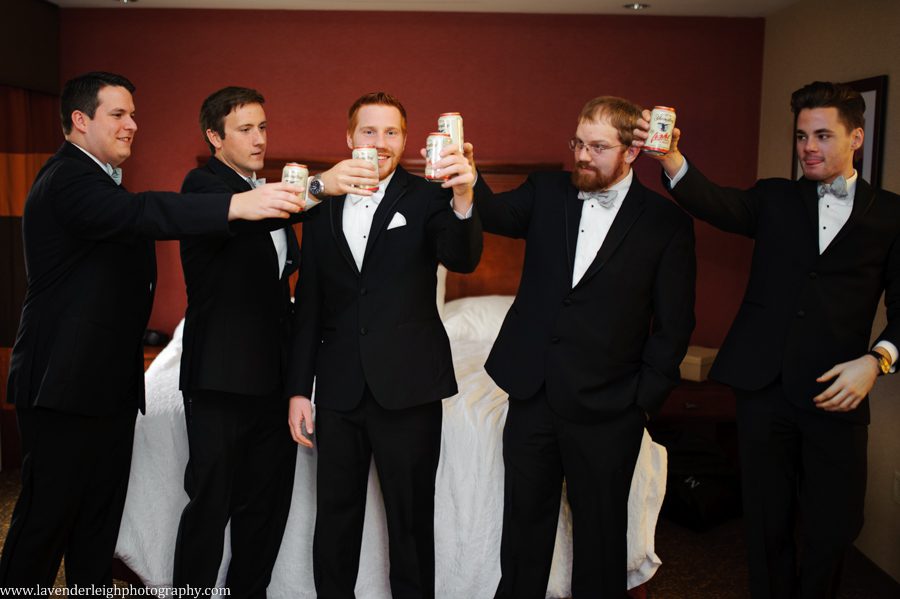 A toast between groomsmen and groom on his wedding day