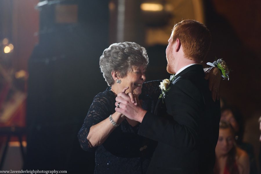 A groom and his grandmother dance at a wedding reception at the Heinz History Center