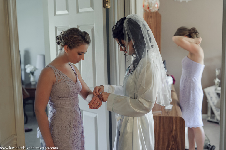 getting ready, pre ceremony, bride, bridesmaid, bracelet