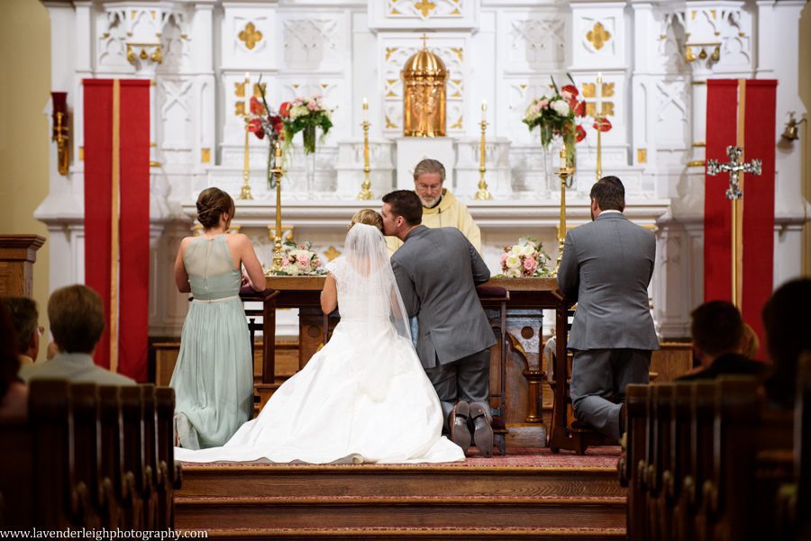 St. Mary of the Mount, Wedding, Pittsburgh, May, Groom kisses bride during communion