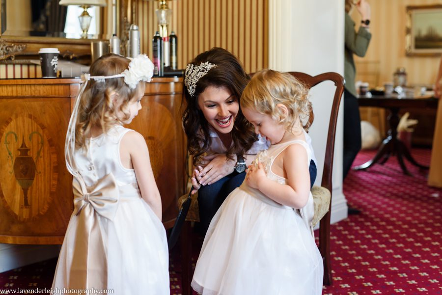 The bride spends time with her flower girls at the Omni William Penn in Pittsburgh, Pennsylvania