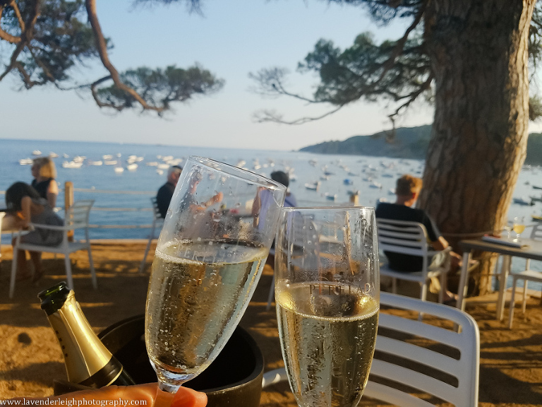 Toasting our 9th anniversary.  Our favorite view of Calella de Palafrugell from 3 Pins.