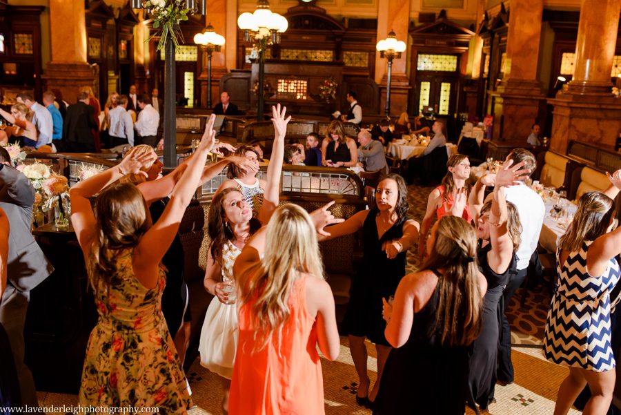 The wedding guests dance at a reception at The Grand Concourse in Pittsburgh, Pennsylvania