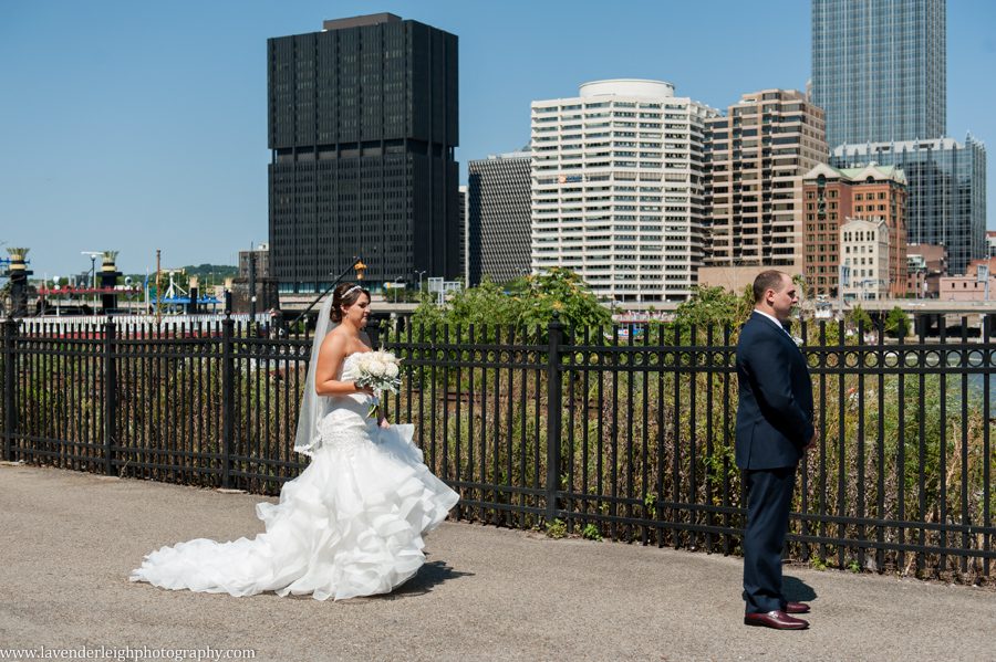 The bride and groom have a first look at the Sheraton Station Square in Pittsburgh, Pennsylvania