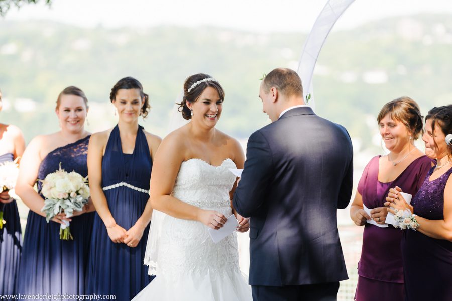 The bride laughs at the groom's comical vows at the West End Overlook in Pittsburgh, Pennsylvania