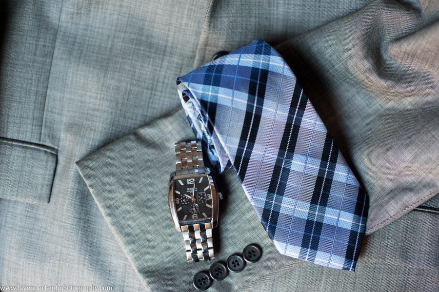 The groom's getting ready details- a watch and tie