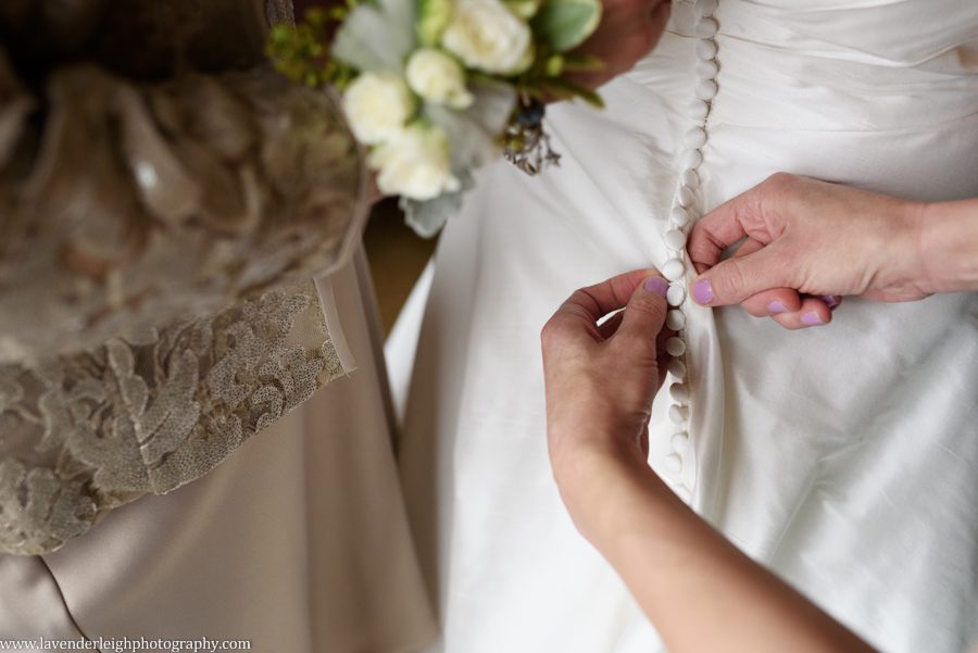 wedding dress, Bridal Beginnings, bride, satin, buttons, getting ready