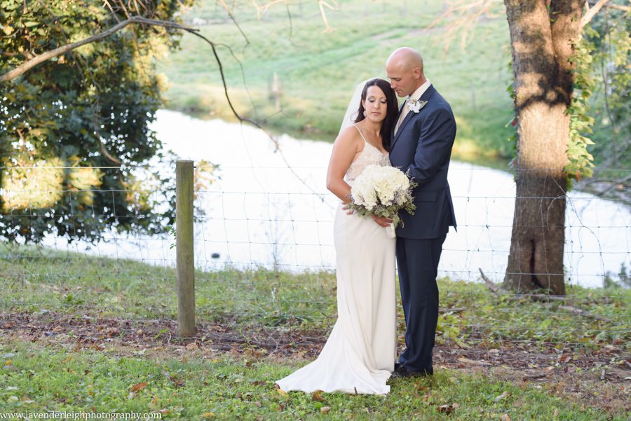 A picture of the bride and groom by the lake at Greendance, the Winery at Sandhill in Mt. Pleasant, Pennsylvania