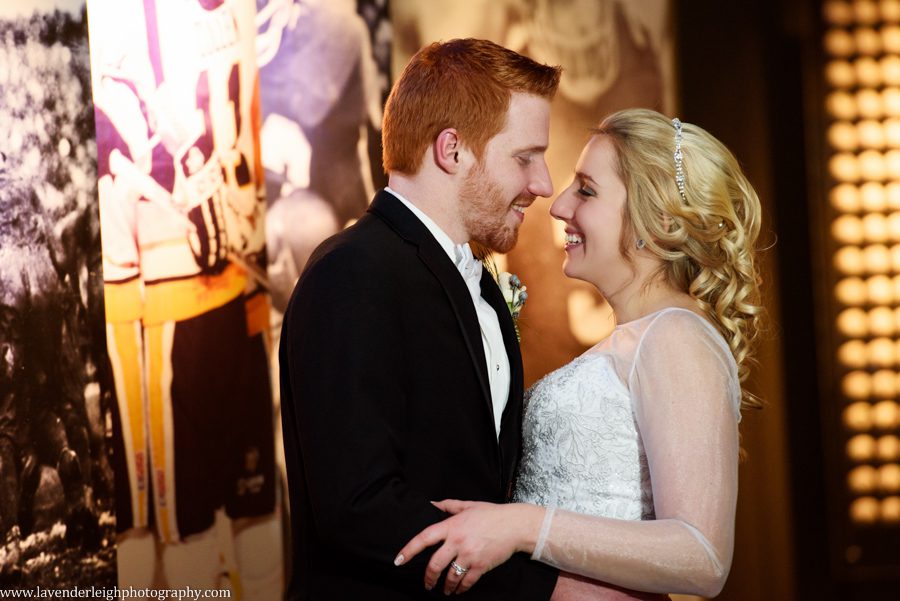 A bride and groom on the Sports floor of the Heinz History Center
