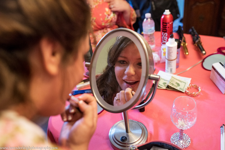 Bride Putting on Lipstick | Pink Floral Matching Bridal Party Robes | Holy Cross Wedding | Pittsburgh Wedding Photographer | Pittsburgh Engagement Photographer | Lavender Leigh Photography 