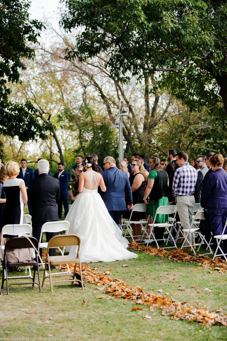 The father walks the bride down the wedding aisle at The West End Overlook in Pittsburgh, Pennsylvania