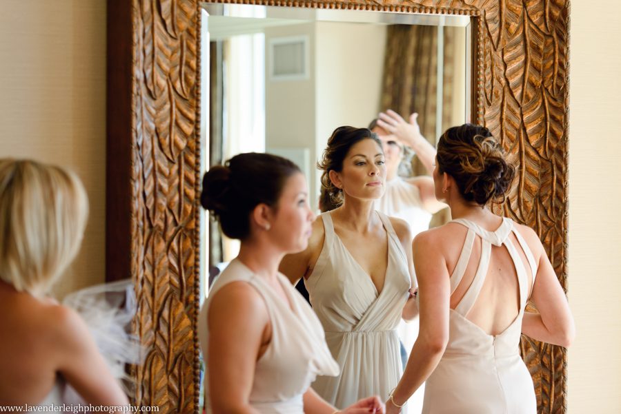 The bridesmaids putting on their finishing makeup touches at the Wyndham Grand Downtown Pittsburgh