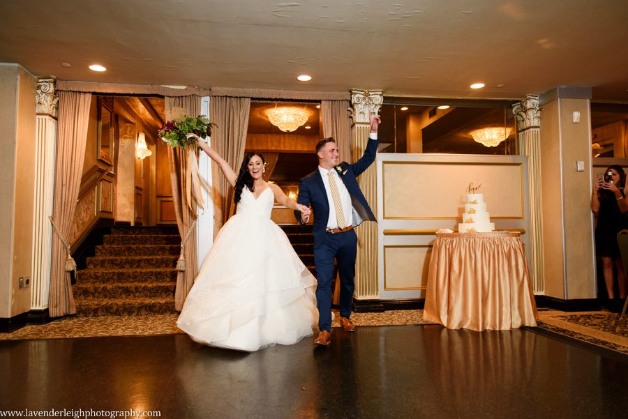 The bride and groom get introduced into their wedding reception at The LeMont in Pittsburgh, Pennsylvania