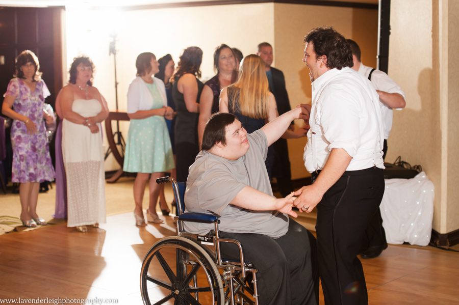 Groom Dancing with Brother
