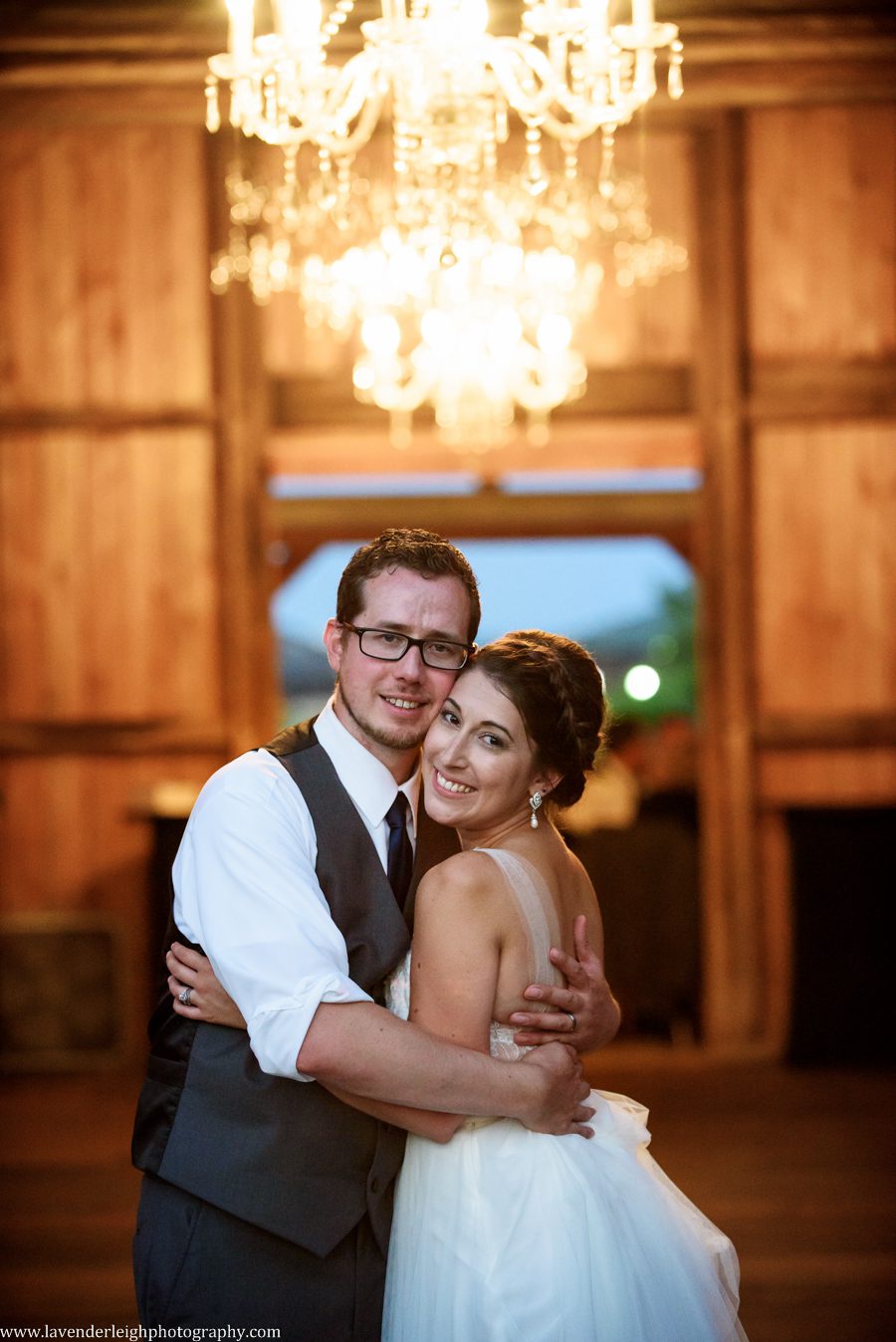 Bride and Groom Under Chandelier | Barn Wedding | Rustic Acres Wedding Reception | Rustic Acres Ceremony | Watters Love Marley Wedding Dress | Pittsburgh Wedding Photographer | Pittsburgh Wedding Photographers | Lavender Leigh Photography | Blog