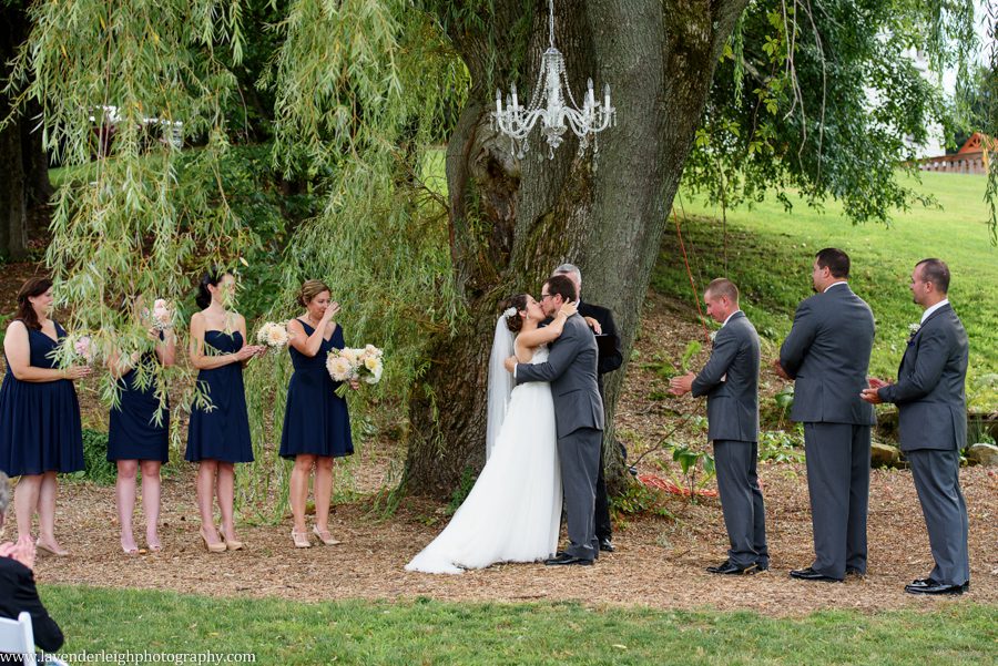Bride and Groom Kiss | Wedding Ceremony | Weeping Willow Tree | Chandelier | Barn Wedding | Rustic Acres Wedding Reception | Rustic Acres Ceremony | Watters Love Marley Wedding Dress | Pittsburgh Wedding Photographer | Pittsburgh Wedding Photographers | Lavender Leigh Photography | Blog
