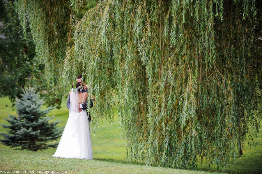 Bride and Groom Have a Moment Alone | Post Recessional | Wedding Ceremony | Weeping Willow Tree | Chandelier | Barn Wedding | Rustic Acres Wedding Reception | Rustic Acres Ceremony | Watters Love Marley Wedding Dress | Pittsburgh Wedding Photographer | Pittsburgh Wedding Photographers | Lavender Leigh Photography | Blog
