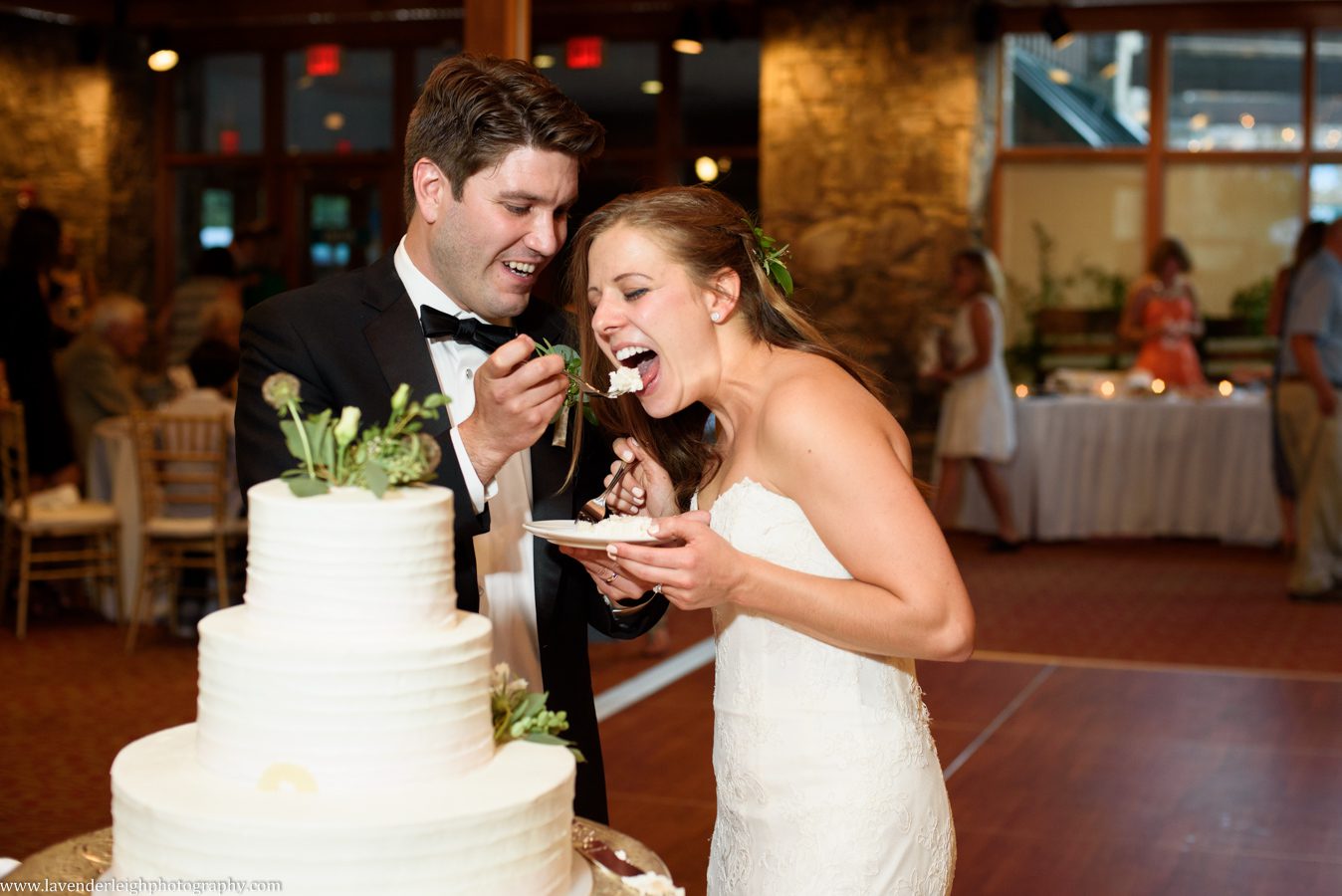 Groom Feeding Cake to the Bride