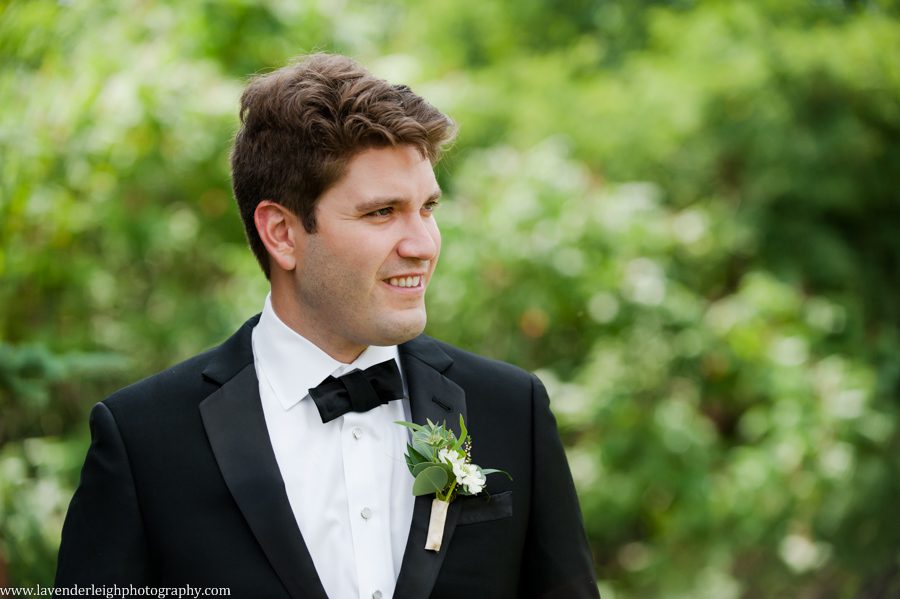 A headshot of a groom