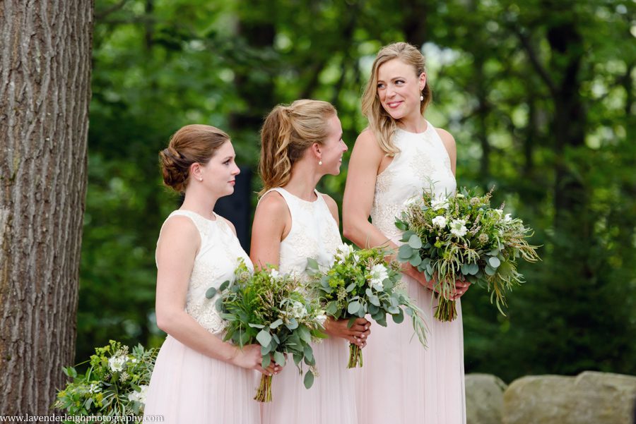 The bridesmaids wore a beautiful blush skirt and lace bodice.