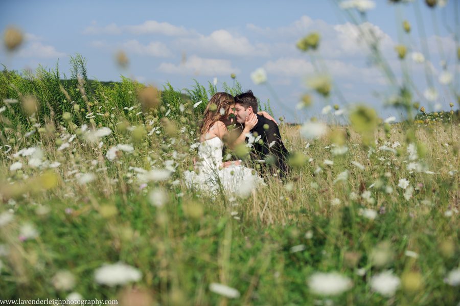 A Bride, A Groom, and a Field of Daisies
