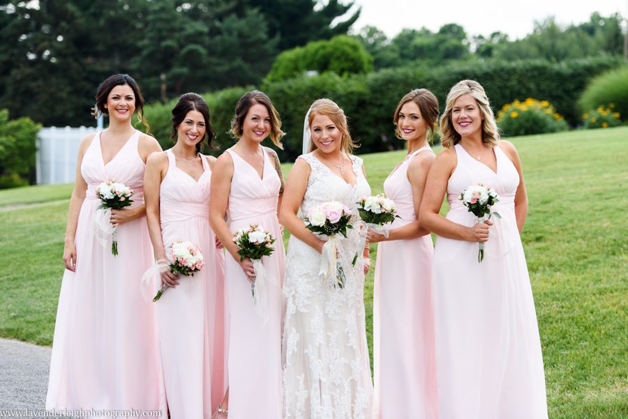 Blush bridesmaid dresses, white and pink bouquets