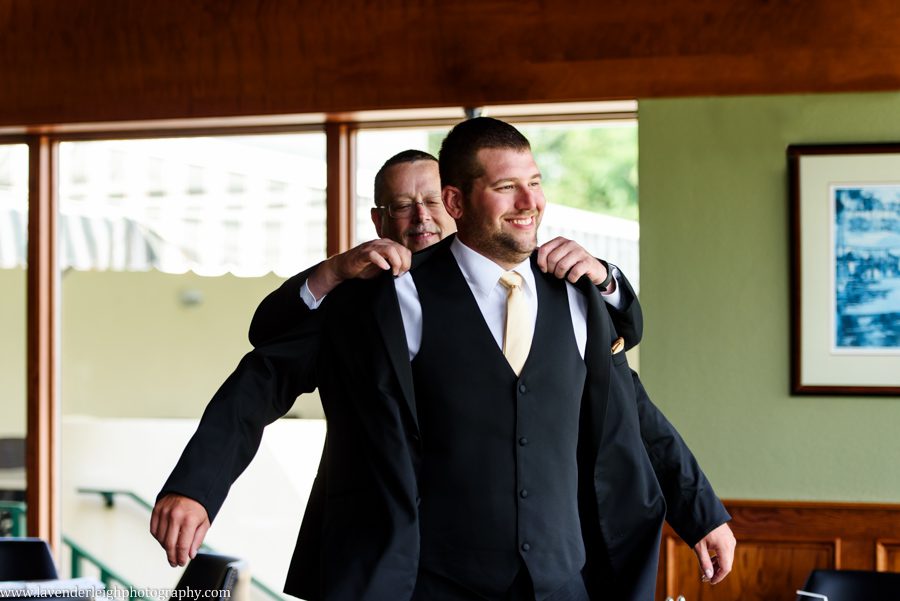 black tux, gold pocket square, groom, father, getting ready, wedding day
