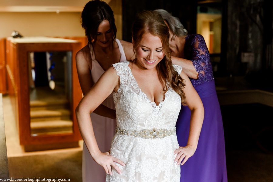 lace overlay wedding gown, getting ready, wedding day, bride, mother, sister