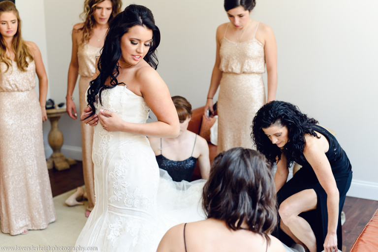 Bride Getting Into Dress