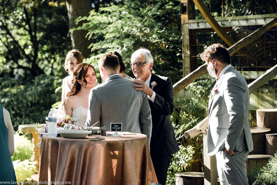 <alt>father hands off bride to groom at Choderwood in Pittsburgh, Pennsylvania</alt>
