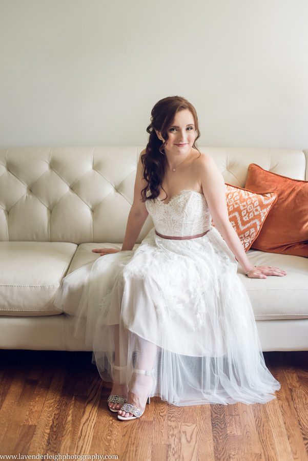 <alt>bride sitting on couch</alt>
