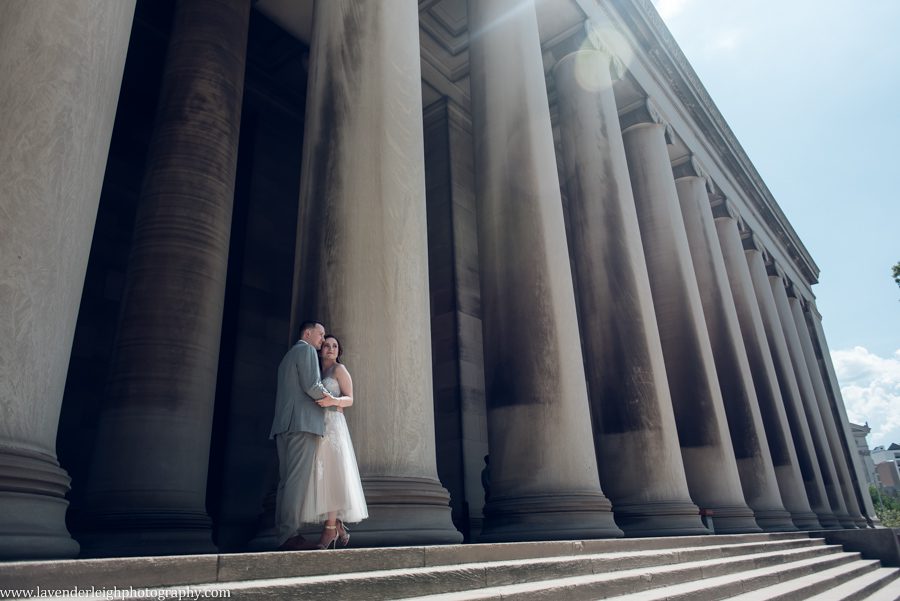 <alt>bride and groom at the School of Architecture Pillars at Carnegie Mellon University in Pittsburgh, Pennsylvania</alt>